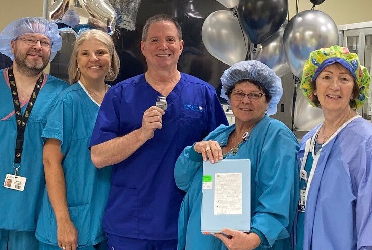 Abrazo Arrowhead operating room staff celebrate completing the hospital’s first Optimizer device implant to treat heart failure.