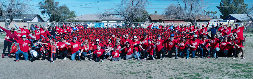 Hartford Sylvia Encinas Elementary faculty and students pose for a group photo with 830 bicycles. South Carolina-based nonprofit Going Places recently partnered with some Chandler organizations to provide 830 free bicycles to Hartford Encinas students. 