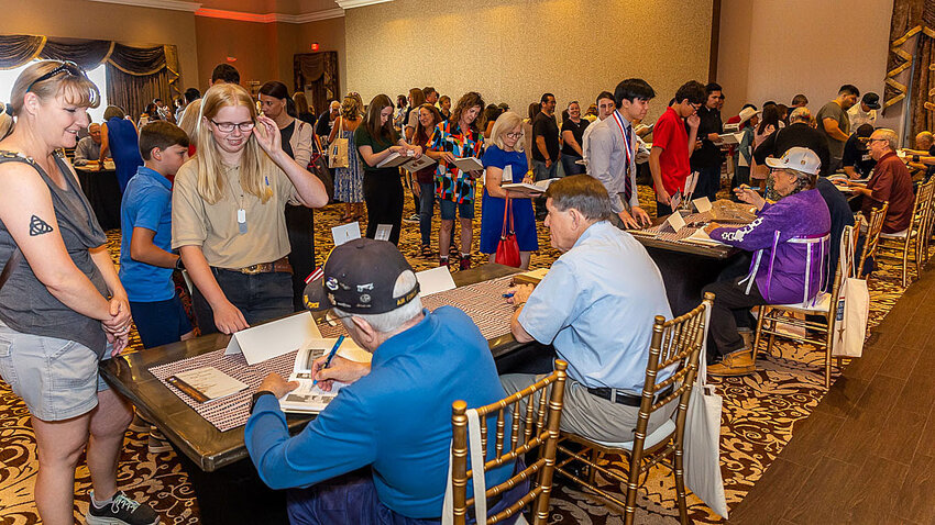 A look at a book signing line at a recent event.