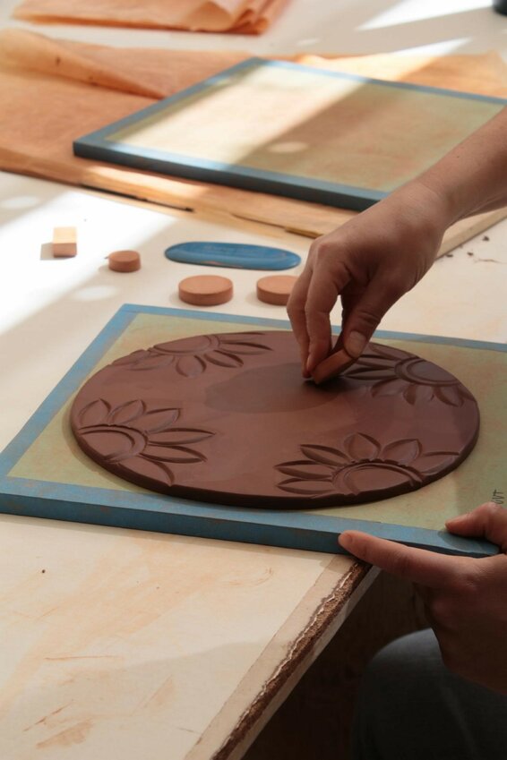 Participants can enjoy a hands-on tile-making workshop using clay and water to create one-of-a-kind tiles. (Photo courtesy of J. David Tabor)
