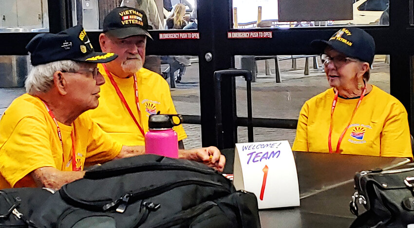 Waiting for the latest Honor Flight Arizona flight departure are, from left, Navy veteran Jay Rigle, of Glendale; Army veteran Rick Taylor; and Rick’s wife, Navy veteran Terry Taylor, both of Scottsdale.