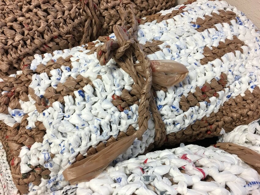 The plastic is crocheted into plastic mats and compassion bags for homeless individuals. (Photo courtesy of Homeless Matters)
