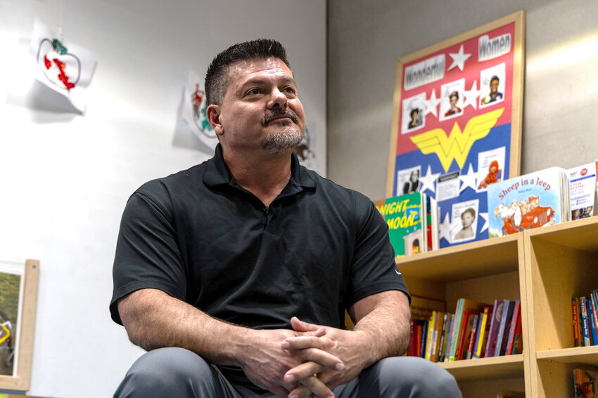 Edward Casillas, program and services development manager at the Family Involvement Center, speaks at the Phoenix Families First Resource Center in the Burton Barr Central Library about his experience as a dad. Photo taken in Phoenix on April 8, 2024. (Photo by Emily Mai/Cronkite News)