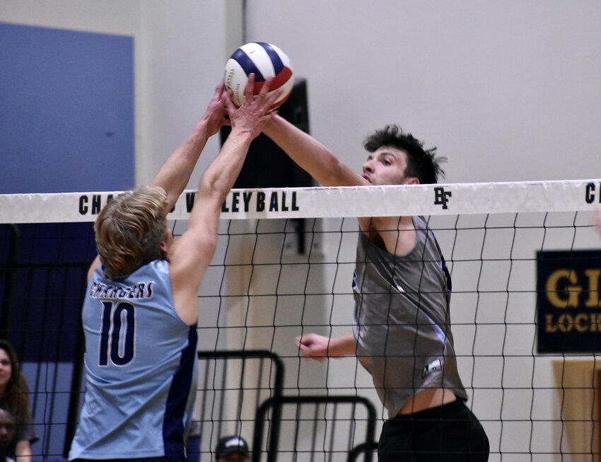 Cactus senior Bradey Henige, right, battles Benjamin Franklin’s Joshua Williams for a 50-50 ball in the Cobras’ first-round 4A state tournament loss May 3 in Queen Creek.