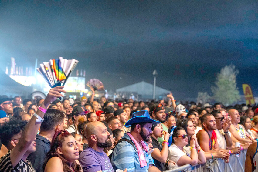 Fans enjoy a show during Phoenix Pride in October of last year. Hotter summers and larger and larger crowds have led organizers to move some Pride events in the Valley to the fall.