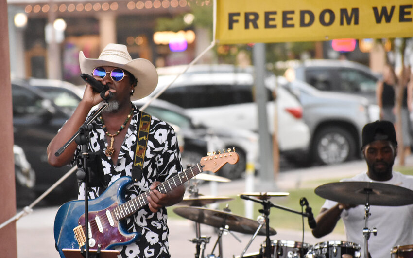 Vaughn Willis performs with the band Ear Candy at Chandler’s Juneteenth event earlier this month.