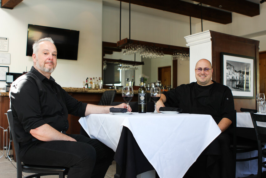 “Vacation to me is working in a restaurant,” says front-of-house Manager Matthew Oliver (left).