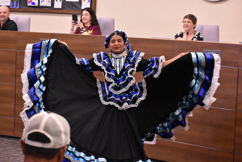 Emma Hernandez performs a traditional folklorico dance at a recent Chandler Unified School District Hispanic Heritage Month event. 