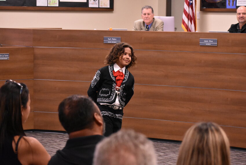 Levi Hernandez performs a traditional folklorico dance at a recent Chandler Unified School District Hispanic Heritage Month event. 