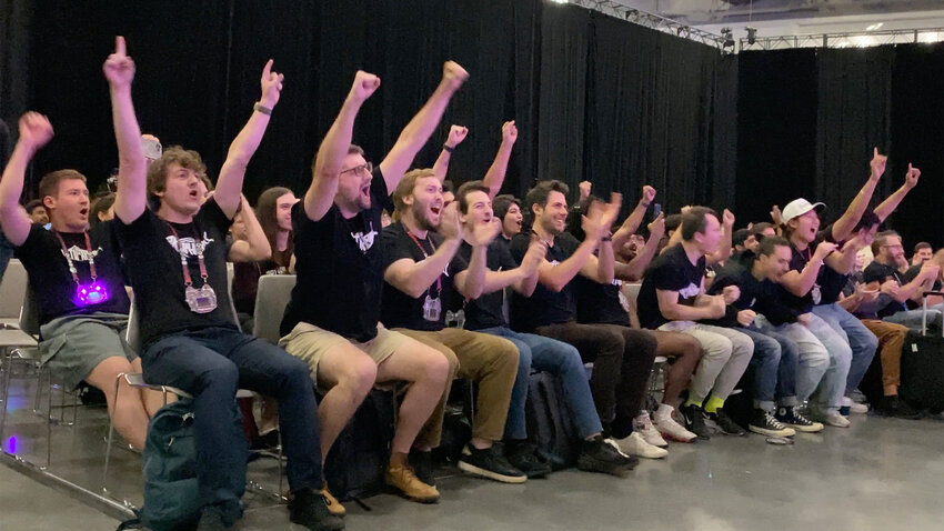 Adam Doupé (second from left), leads Shellphish in a cheer following the cybersecurity team’s big win in a Las Vegas hacking competition in August.