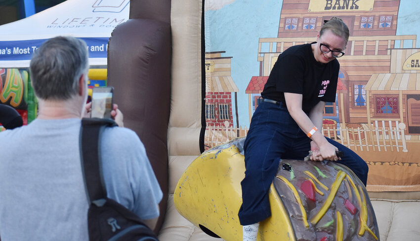 Some visitors rode the "mechanical taco" for fun at the 12th annual Rockin’ Taco Fest Sept. 14 at A.J. Chandler Park.
