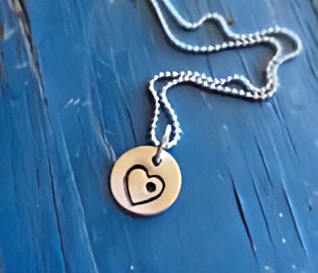 The “Hole in My Heart” charm has proven popular for people grieving a loved one. (Courtesy Leah Williams)