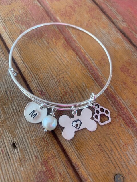 Customers can a specialized charm for their dog.