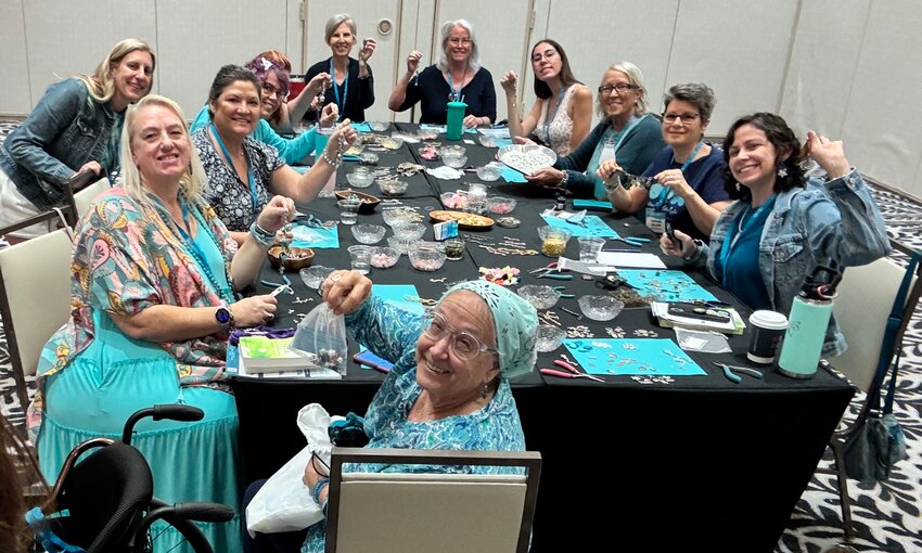 Survivors of ovarian cancer and their caretakers learned how to assemble jewelry.