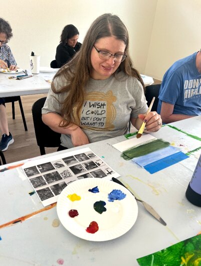 Residents participate in an art therapy class at Everlasting Community Services.