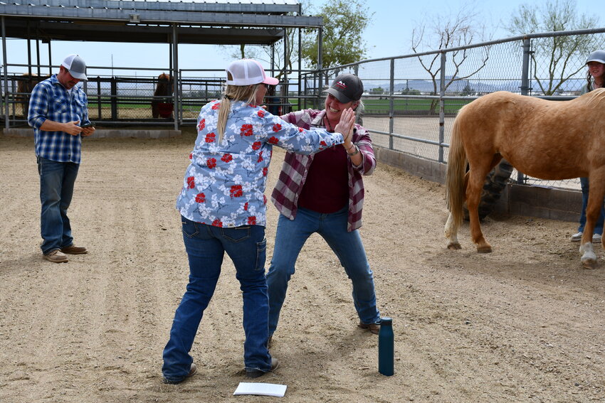 Kim Warner demonstrates that how humans react to mental pressure mirrors horses react to physical pressure.