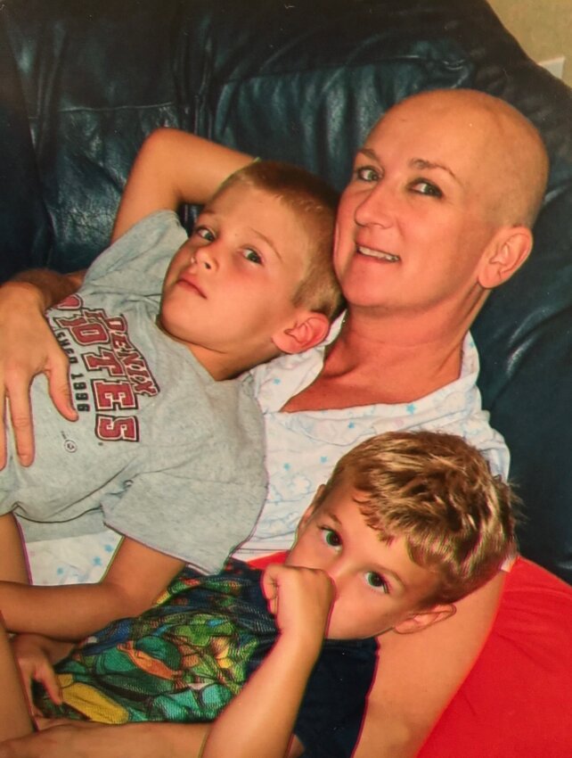 Tyler Shough, left, and his brother, Brady, relax with heir mother, Dana, during her battle with breast cancer, the fight that helped shape Tyler’s unbreakable mindset. (Photo courtesy of Dana Shough)