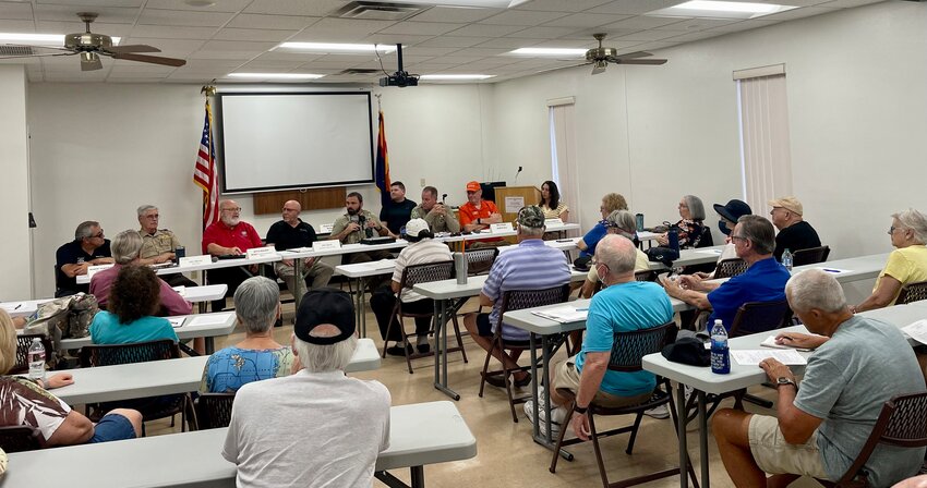 The nine member panel for the Traffic, Roads and Safety Committee at the Property Owners and Residents Association, 13815 Camino del Sol.
