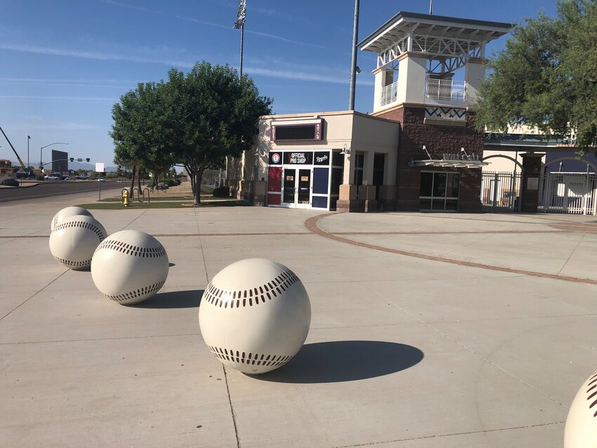 Decorative baseballs circle the entrance to Surprise Stadium.