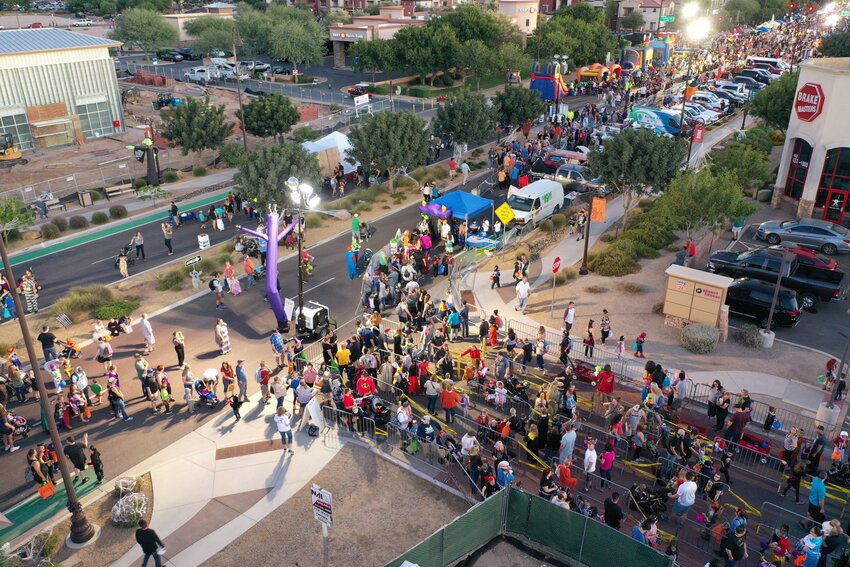 According to the town of Queen Creek, more than 20,000 people congregated on closed streets and parking lots during its Halloween Trunk or Treat event in 2023. As a result of its growing size, the Halloween event will no longer be a signature event for Queen Creek and will be replaced in 2024 by the Queen Creek Hometown Christmas Parade,