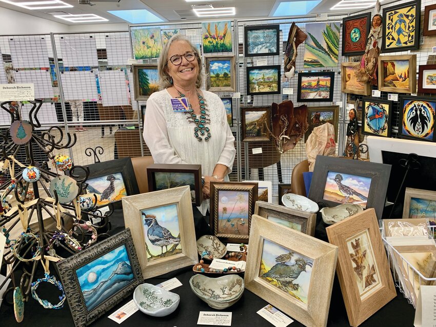 The Verdes Art League held a show and sale at Rio Verde Saturday, Nov. 18. Deborah Etcheson displays her work with Southwest and desert themes at one of the booths. (Submitted photo)