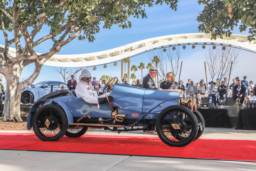 Arizona Concours d'Elegance showcases cars on a red carpet at the main stage of Scottsdale Civic Center.