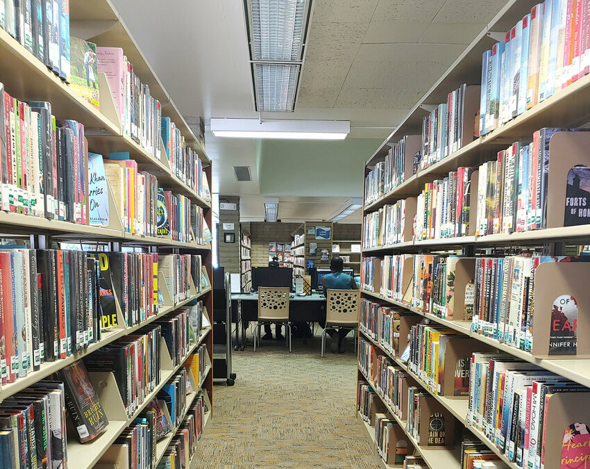 Patrons keep busy at the Velma Teague Library in downtown Glendale. The city's summer reading program begins June 1.