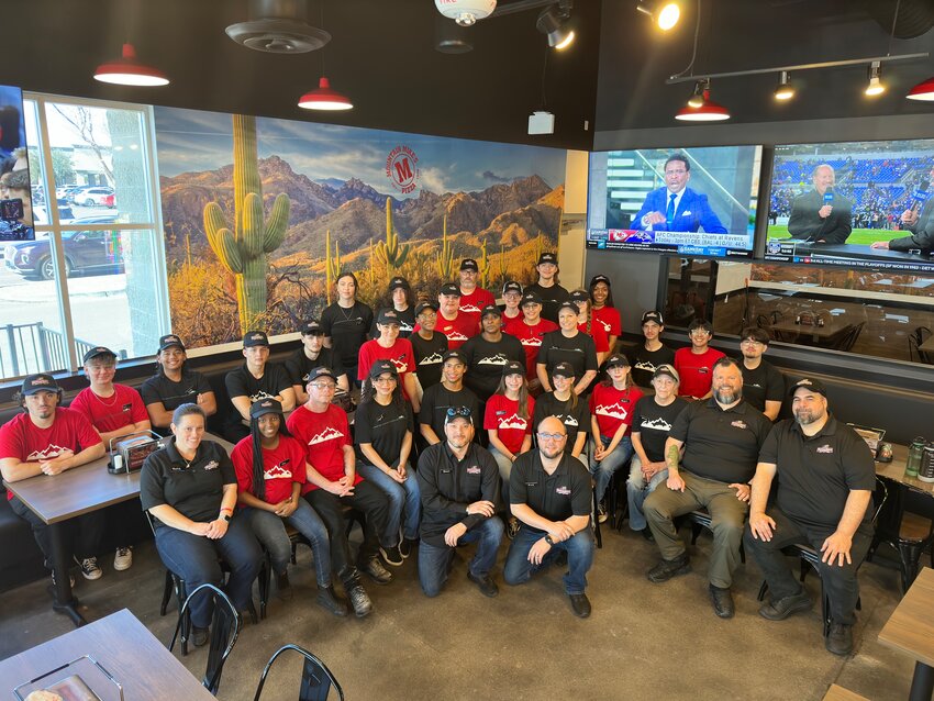 The Mountain Mike&rsquo;s staff poses for the opening of the new restaurant in Surprise at 13736 W. Bell Road.