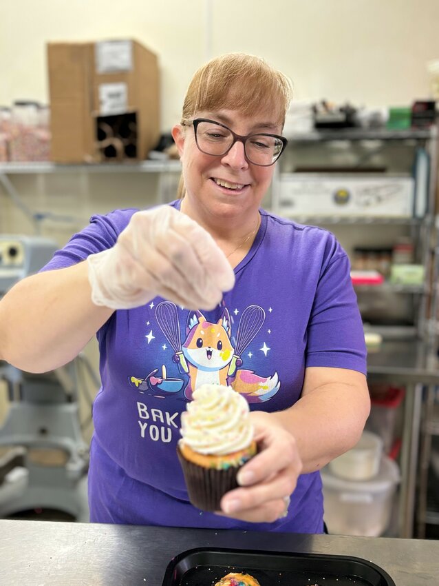 Catherine Forlasto works on a confection at Toasted Mallow Cupcakery in Chandler. The confectionery has several unique bakery and dessert items at its location on the west side of Arizona Avenue near Loop 202, in the front of a Walmart shopping center.