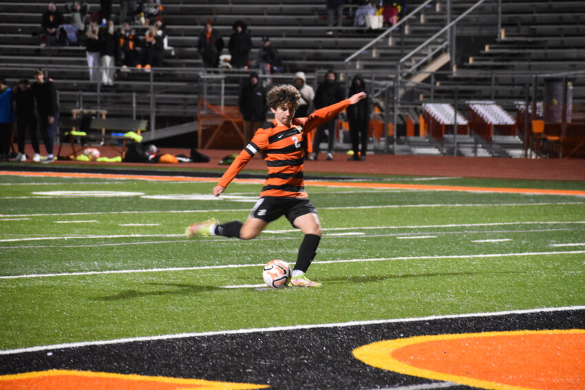 Corona del Sol senior Daniel Lawton scores in the penalty shootout to help seal the play-in victory. (Independent Newsmedia/George Zeliff)