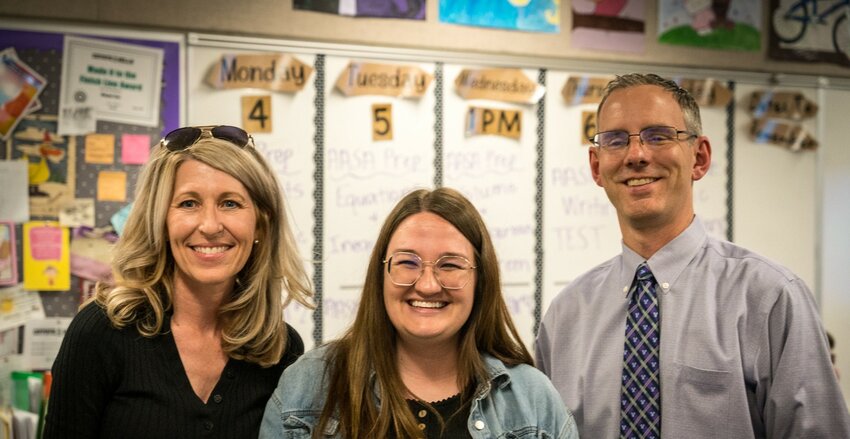 Coyote Hills Elementary School teacher Megan Cox (middle) has been named a Peoria Hometown Hero in the educator category.