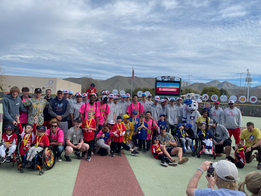 The Savannah Bananas and Party Animal baseball teams joined players from the Miracle League of Arizona after their banana ball game. (Submitted photo)