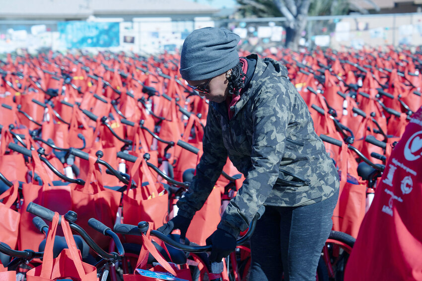 One of 830 bicycles is inspected at Hartford Sylvia Encinas Elementary. South Carolina-based nonprofit Going Places partnered with some Chandler organizations to provide the free bicycles to Hartford Encinas students.