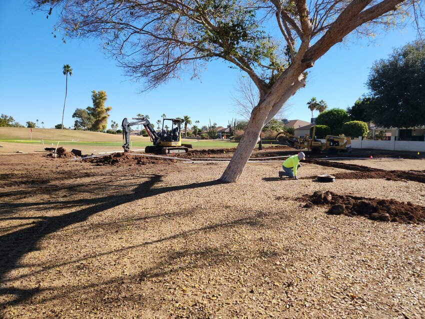 Crews from the Recreation Centers of Sun City West environmental services team works on the desert landscaping at Stardust Golf Course, 12702 Stardust Blvd.