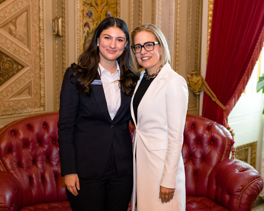 An Arizona College Prep High School senior recently learned she&rsquo;s been selected for a select program and honor. Camillia Baker, left, shown here with U.S. Sen. Kyrsten Sinema, was one of two Arizona high school students chosen to join Sinema and Sen. Mark Kelly in representing Arizona during the 62nd annual USSYP Washington Week, set for March 2-9 in Washington, D.C. The students will also receive $10,000 scholarships.