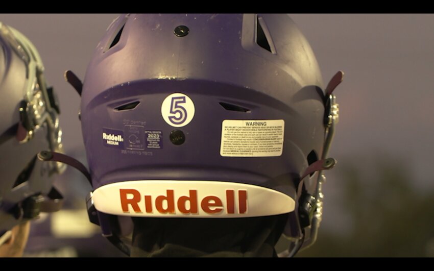 Cesar Chavez High School players wore No. 5 on their helmets in honor of Christopher Hampton during the 2023 football season. Hampton&rsquo;s family filed a $50 million lawsuit Monday. (File photo by Beatriz Martinez/Cronkite News)