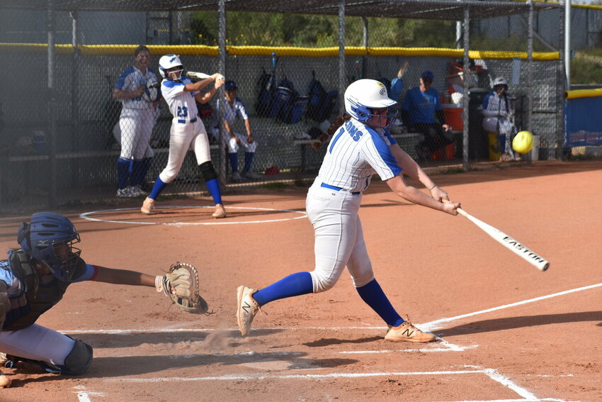 Junior Sammantha Hughes makes a big hit last year. Hughes hit a home run in the Falcon&rsquo;s 14-13 loss against Parker. (Independent Newsmedia/George Zeliff)