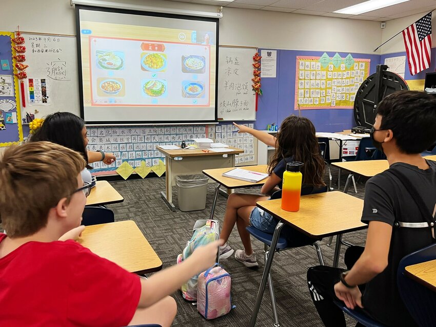 Bogle Junior High School students work on a classroom lesson in September. A Chandler Unified School District spokesperson said this week that a new report on ratios of types of K-12 education spending in Arizona shows CUSD is making choices that benefit students.