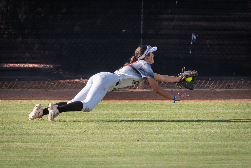Shadow Ridge sophomore outfielder Liliana Moreno lays out for a diving catch of a deep drive by Xavier Prep during a 6A playoff elimination game May 2, 2023 at Shadow Ridge High School in Surprise. Moreno returns for this season, along with most of the Stallions&rsquo; starting lineup.