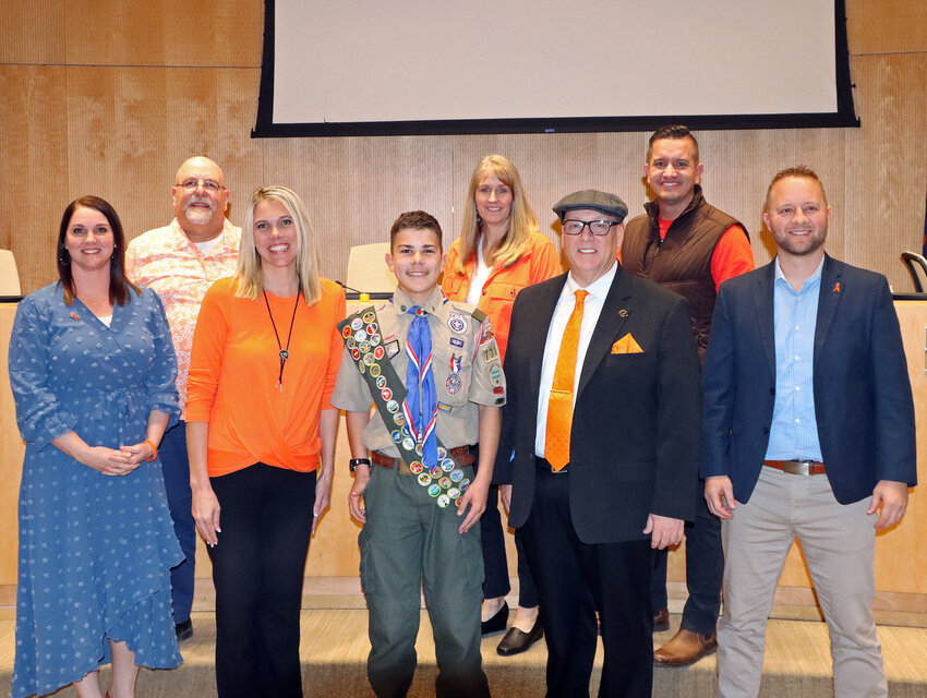 Eagle Scout Luke Ochoa stands with members of the Queen Creek Town Council after presenting his community service project.