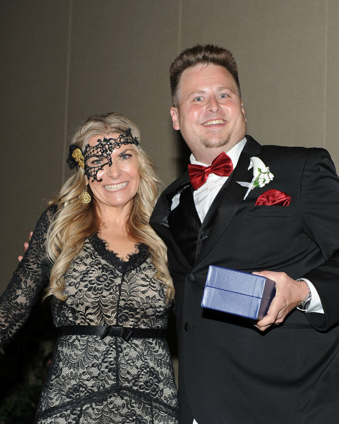 The Fountain Hills Chamber Gala recognizes local business owners, employees, nonprofits and volunteers in Fountain Hills. Pictured is Chamber President Betsy LaVoie (left) with Michael Bennett, Young Professional of the Year in 2023.
