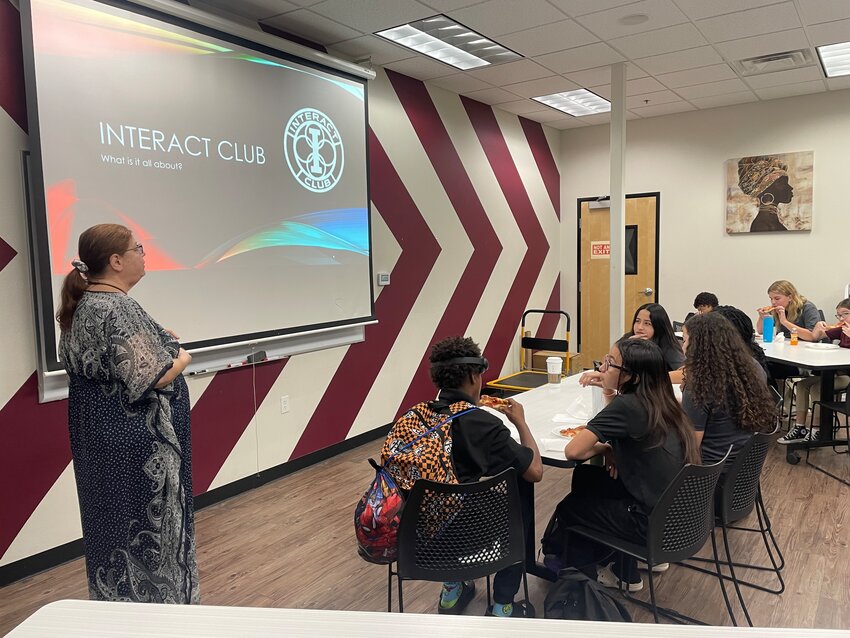 Arizona Charter Academy sixth-grade ELA teacher and longtime Interact Club Sponsor Jeri Robertson leads a meeting of the Interact Club with middle school students in sixth through eighth grades.