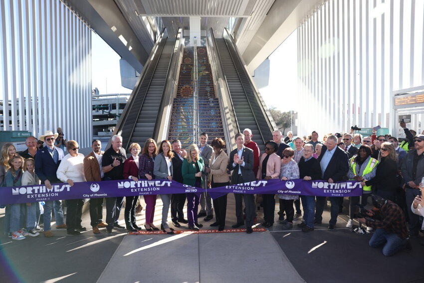 Local officials in cut the ribbon to open the new Northwest Extension Phase II light rail line at the new Thelda Williams Transit Center, near Metrocenter at Interstate 17 and Mountain View ROad in Phoenix. (Courtesy Valley Metro)