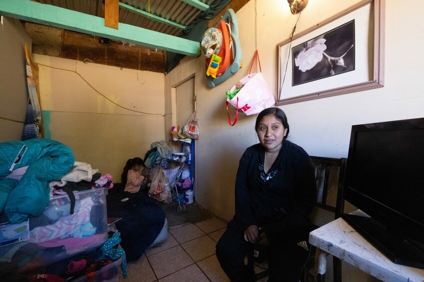 Marisol S&aacute;nchez Hernandez and her 6-year-old daughter sit in their temporary home in Nogales, Sonora, Mexico, on Feb. 12, 2024, while awaiting an asylum court date in the U.S. (Photo by Kayla Jackson/Cronkite News)