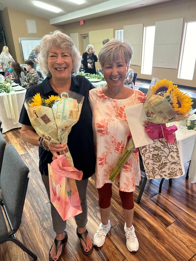 Cornerstone Family Church Fountain Hills recently held a banquet ceremony for two retiring leaders in the church&rsquo;s Children&rsquo;s/Youth Music Ministry. From left, Beverly Vick and Bette Vance hold up their retirement gifts.