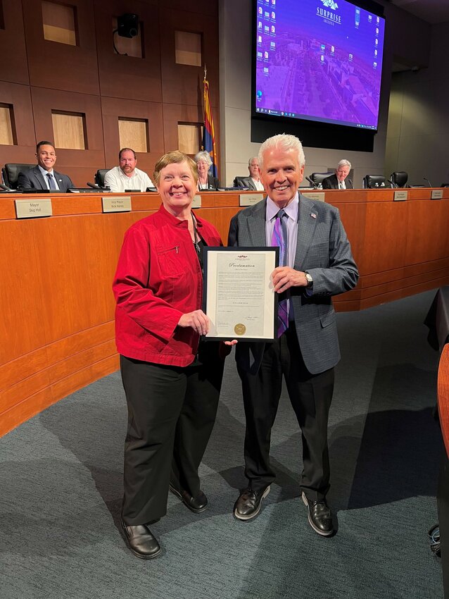 Mayor Skip Hall, right, and the Surprise City Council issued a proclamation recognizing March 18 to 24 as Fix-A-Leak Week during this week's meeting.