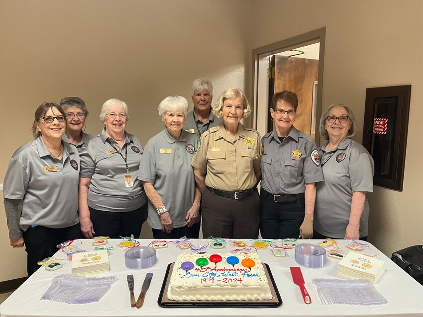 Patty Werner, Shirley Weldon, Jo Boulet, Lt. Fran McElroy, Caren Halloran and Margi Haas with Rosemary Abrami and Susan Spinosa celebrate the Sun City West Posse&rsquo;s 45th anniversary.