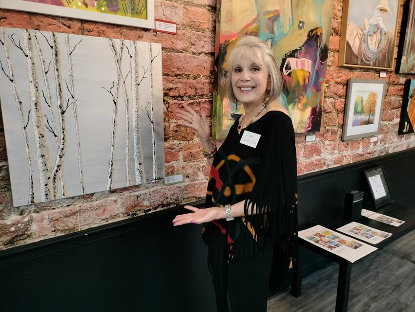 Neu Art Group member Lee Goldstein displays her artwork.