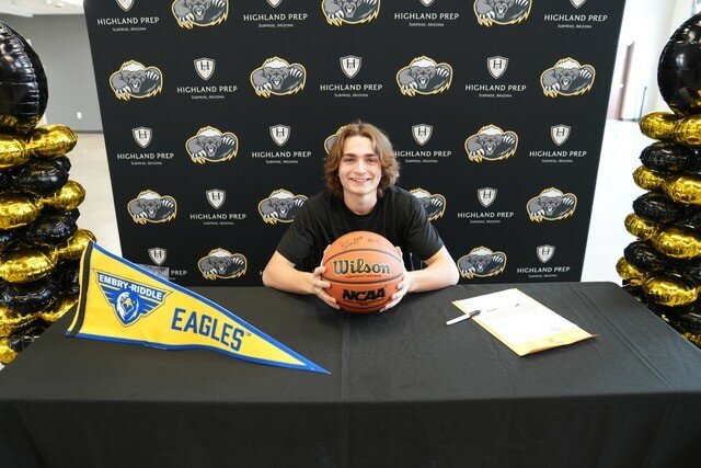 Highland Prep senior Kohen Hill smiles after signing to play basketball at Embry-Riddle Aeronautical University in Prescott.