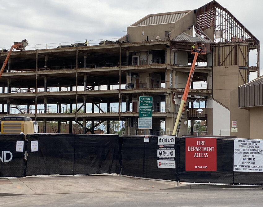 Demolition work continues on the old Glendale City Hall building at 59th and Glendale avenues on March 12. The $94 million redevelopment project to transform City Hall and the immediate area around it is scheduled to finish near the end of 2025 .